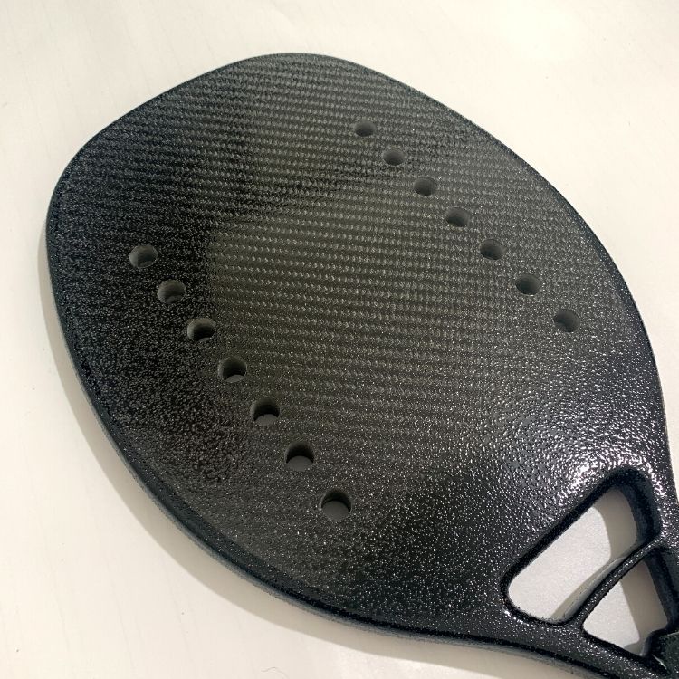 Komposit strand tennisketcher